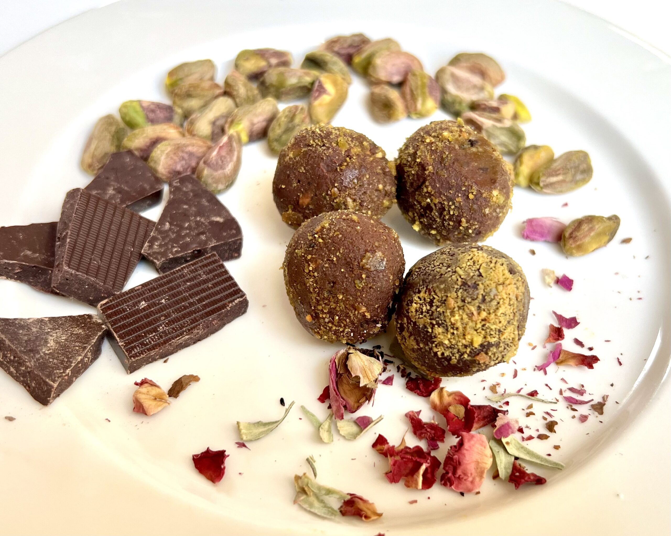 Ayurvedic chocolate truffels with pistachios and rose petals